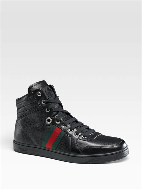 gucci black magnum sneaker|farfetch gucci sneakers men.